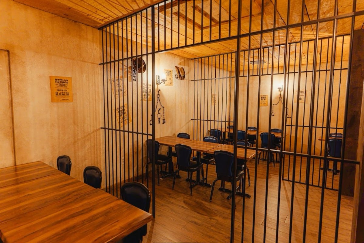 The jail cell semi private dining room at Pink Heifer Monticello